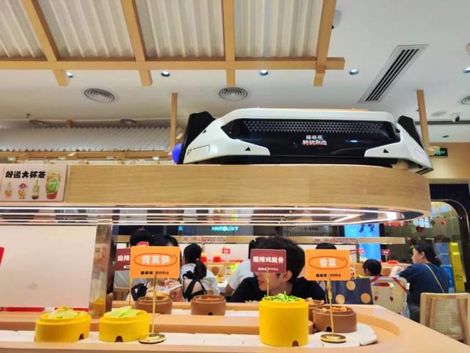 建聚餐海底捞开出首家包间店麻将胡了聚焦商务宴请、团